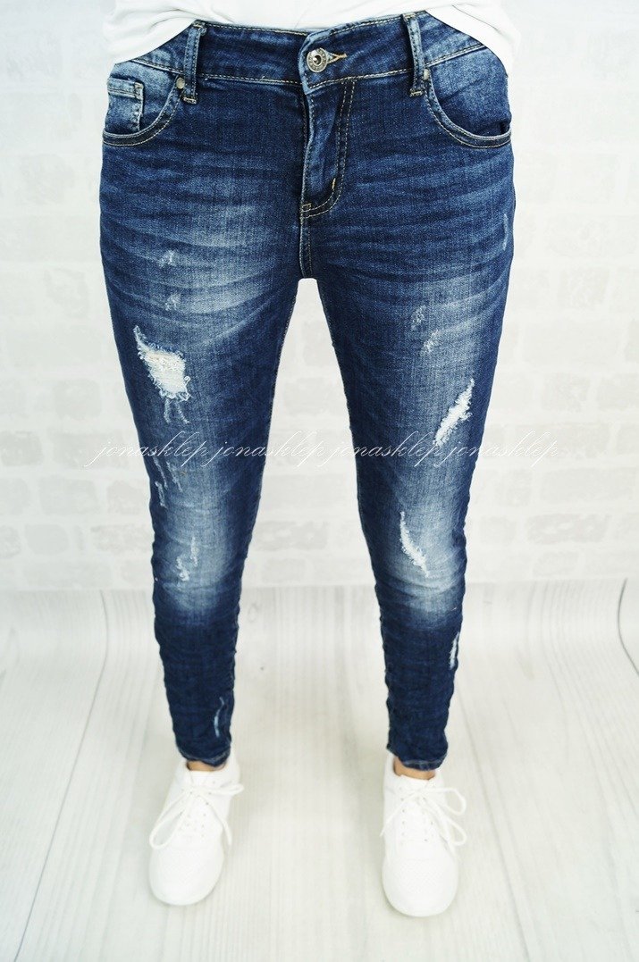 DENIM DESIGN jeansy PRZETARCIA dziury